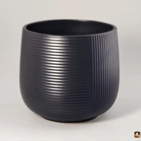 Ribbed matte black ceramic vessel