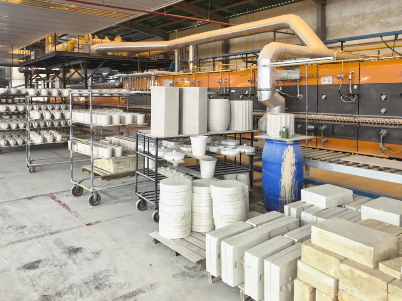 Ceramic ware on drying racks in a Vietnam factory