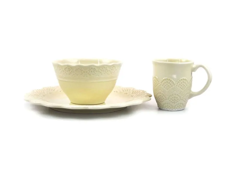 Cream reactive-glaze dinnerware with bowl and mug